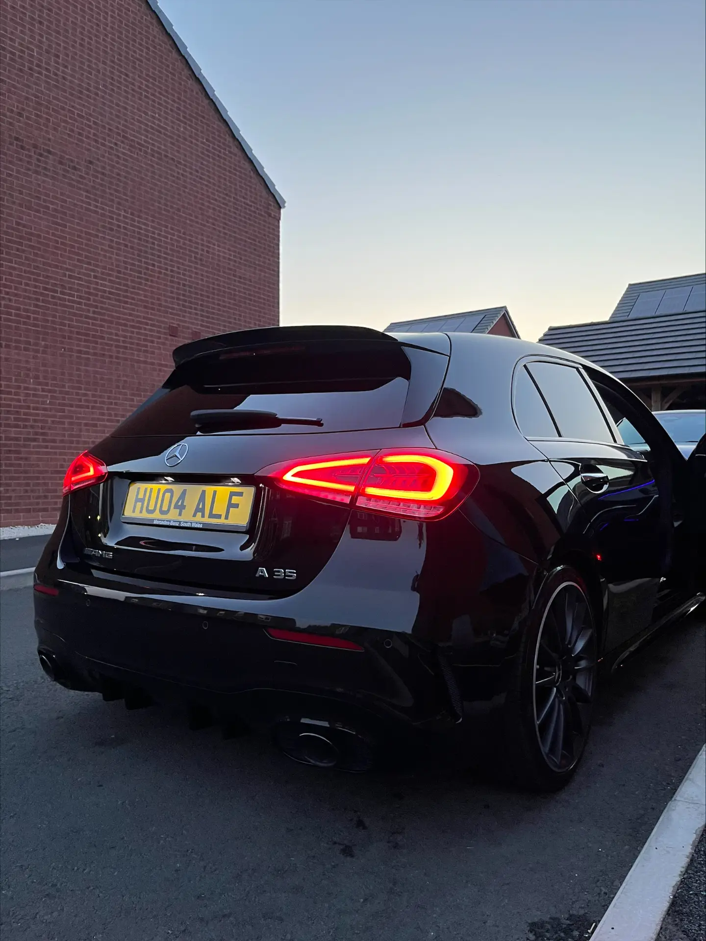 Mercedes AMG with polished paintwork at dusk